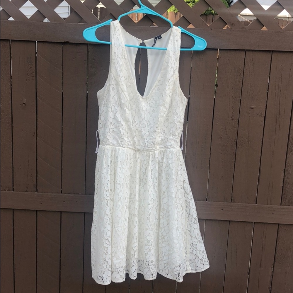 White lace open key hole skater dress